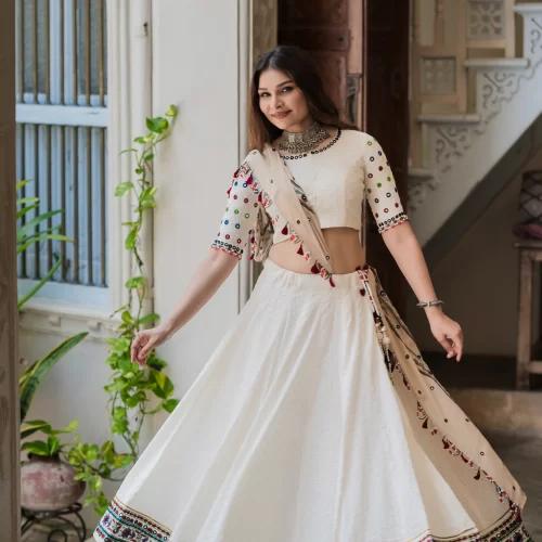 traditional ivory chaniya choli with colorful mirror